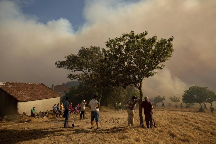 Spain battles one of its most destructive fire seasons even as its heat wave eases