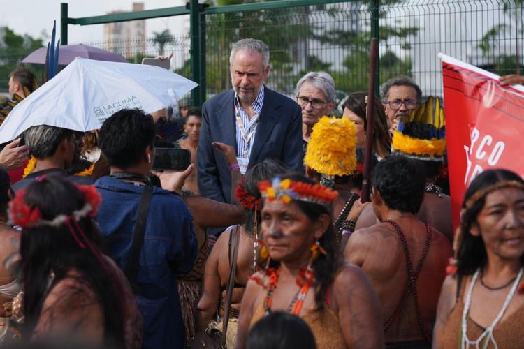 Protesters block the main entrance to COP30 climate talks in Brazil