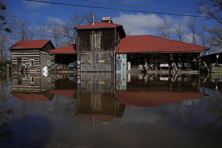 Swollen rivers are flooding towns in the US South after a prolonged deluge of rain