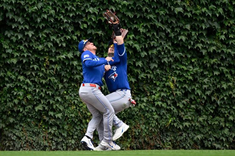 Okamoto hits a 3-run homer as the Blue Jays rally past the Cubs 8-6