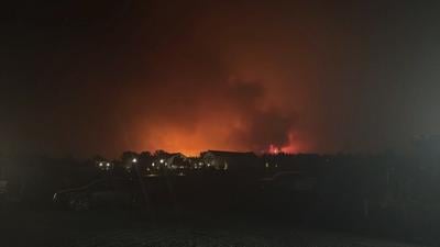 Fast-moving blaze in southwest Utah destroys a dozen structures and forces evacuations