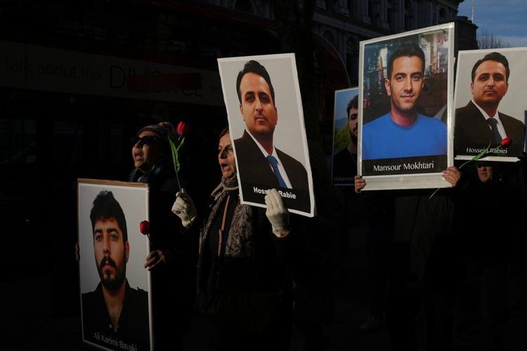 People rally around the world in support of protests in Iran, in photos