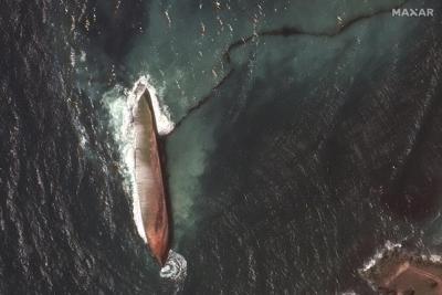Oil spill from capsized barge near Tobago soils beaches hundreds of miles away
