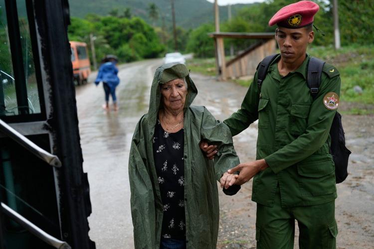 The Latest: Hundreds of thousands evacuate as Hurricane Melissa hits eastern Cuba
