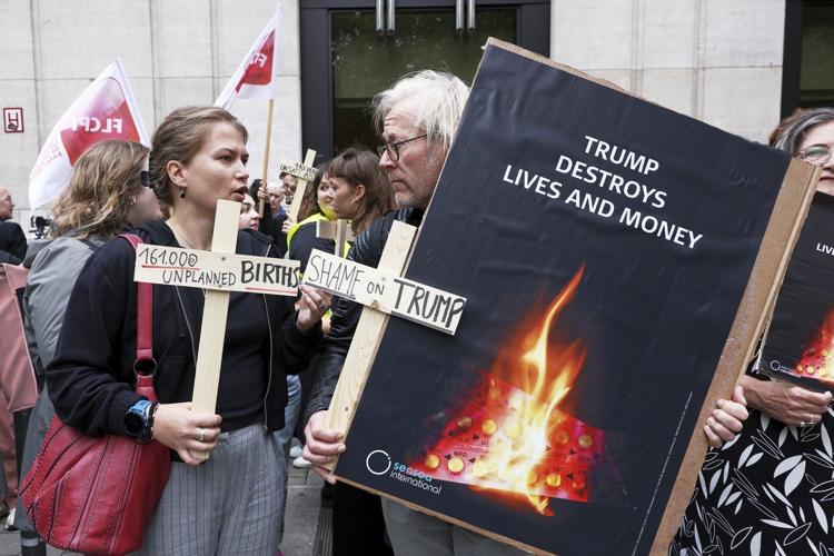 Women's rights activists rally in Belgium fearing US plans for birth control supplies