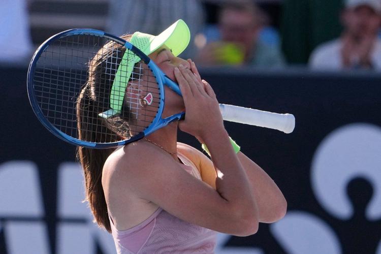 Zeynep Sönmez rushes to aid ballkid during Australian Open upset win