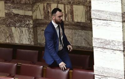 A Greek lawmaker faces a criminal charge for allegedly punching a colleague