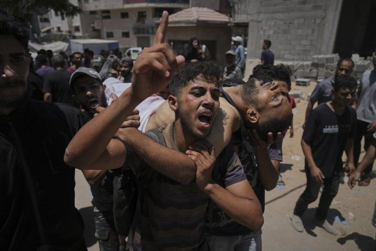 Photos show Gaza's deadliest day for Palestinians looking for food after more than 80 are killed