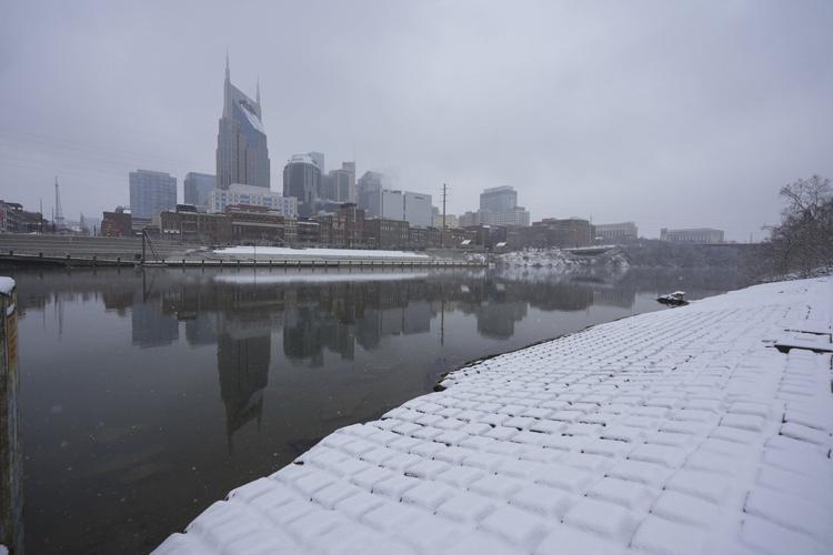 Powerful winter storm that dumped snow in US South maintains its icy grip