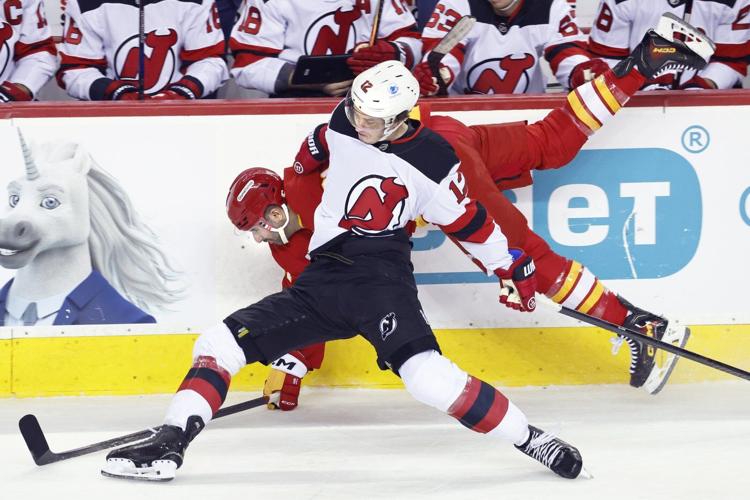 Nemec scores in OT as Devils douse Flames 2-1