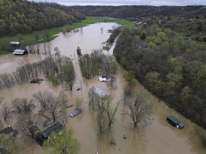 Swollen rivers flood towns in US South after dayslong deluge of rain