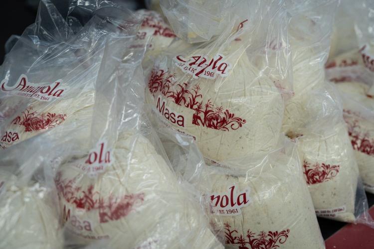Families wait in line for hours to buy masa for Christmas tamales at beloved LA grocer