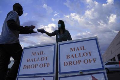 Am I allowed to drop off a ballot for someone else?