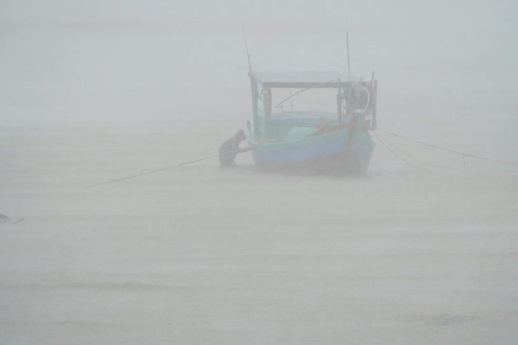 Heavy rain falls in parts of Southeast Asia after tropical storm blows into Vietnam