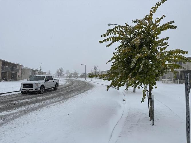 Snow piles up in North Dakota as region's first major snowstorm of the season moves eastward