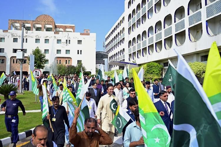 Protesters in Pakistan-held Kashmir mark 5th anniversary of India stripping region of semi-autonomy