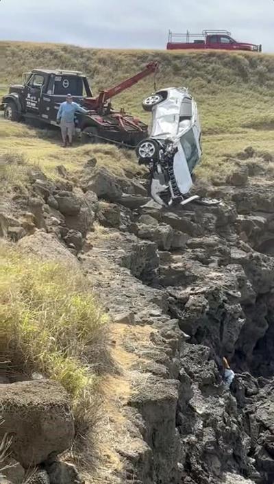 A tourist from Canada was rescued after accidentally driving a rental Jeep off a Hawaii cliff