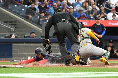 Clement and Barger hit home runs as Blue Jays outscore Athletics 11-7
