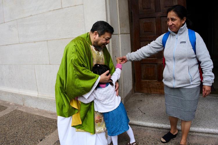 Immigration crackdown stokes fear and solidarity at a Catholic church in DC
