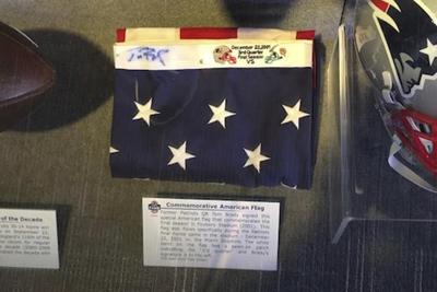 Fan sues Patriots, says they ruined his Brady-signed flag