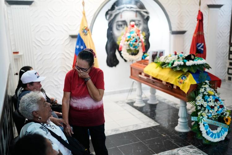 Photos show Venezuelans mourning loved ones killed during US operation to capture Nicolás Maduro