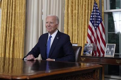 Biden signs bill strengthening oversight of crisis-plagued US Bureau of Prisons after AP reporting