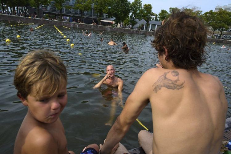 Surrounded by water, Dutch swimmers have plenty of places to cool off