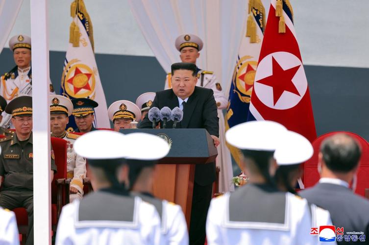 North Korea's Kim claims progress on nuclear-armed navy as new warship is placed into service