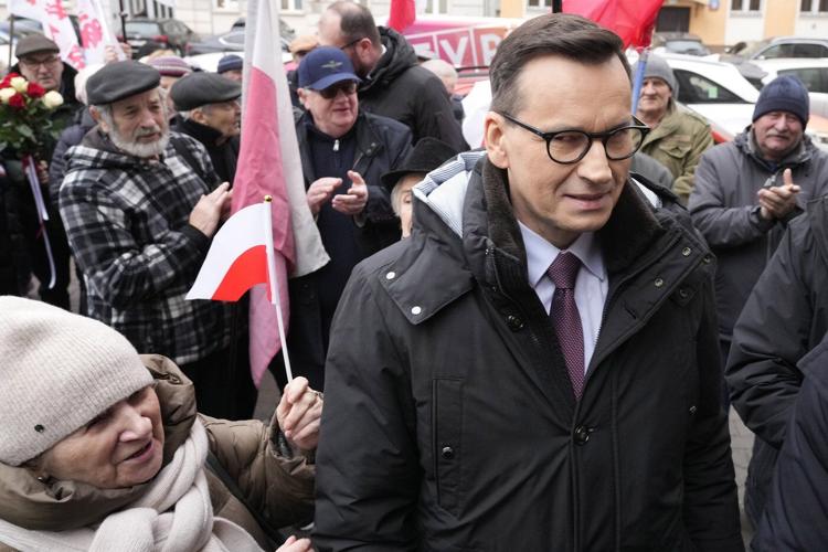 A former Polish prime minister is charged with exceeding his powers over a 2020 election call