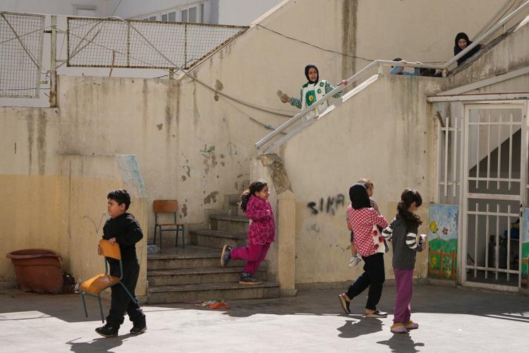 Photos of displaced civilians in Lebanon, where schools and stadiums turn into shelters during war