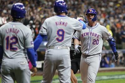 Mets advance in playoffs with 4-2 win over Brewers as Alonso homers to spark 9th-inning rally