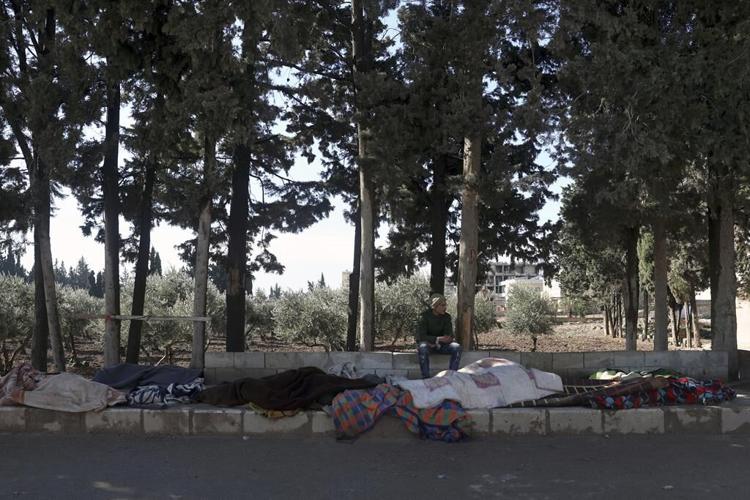 Aid to quake-hit Syria slowed by sanctions, war's divisions