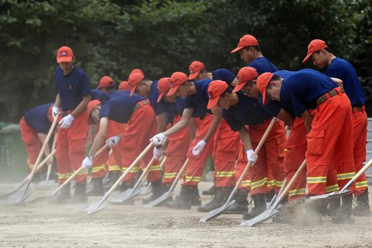 China's Xi calls for measures to mitigate disastrous flooding amid economic slowdown