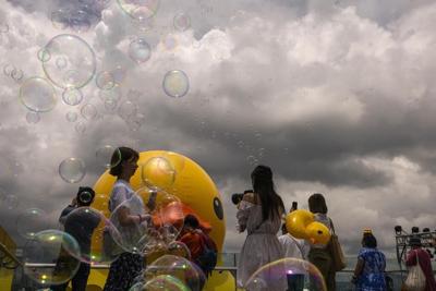 Giant inflatable ducks make a splash in Hong Kong as pop-art project returns after 10 years