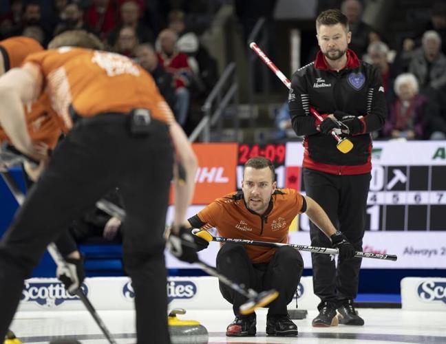 Wild Card 1's Bottcher eliminates Ontario's McEwen in Page 3-4 game at Brier