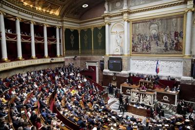 Macron's centrist French govt survives no-confidence votes