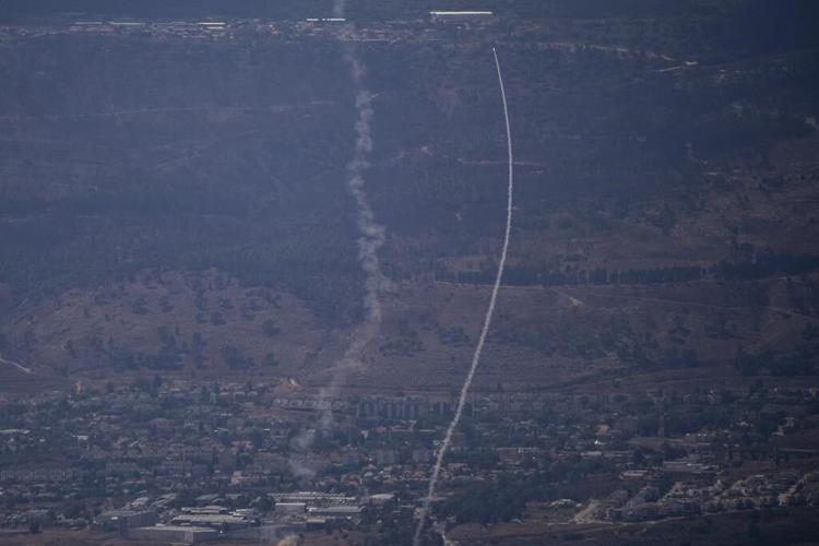 Israel says halting Hezbollah attacks is now a war goal as officials warn of a wider operation