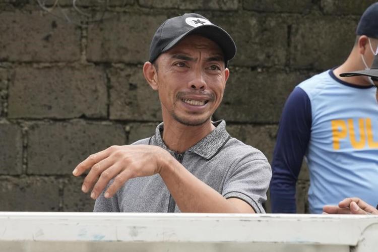 At least 115 dead and missing in massive flooding and landslides in Philippines