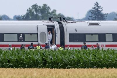 Police say a man injured 4 with a hammer on a German train before he was detained