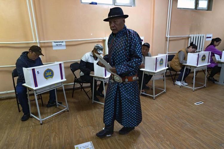 The young democracy of Mongolia begins voting for an expanded 126-seat parliament