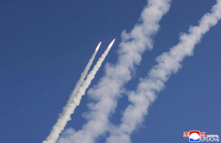 North Korea says leader Kim supervised missile tests simulating nuclear strikes against rivals