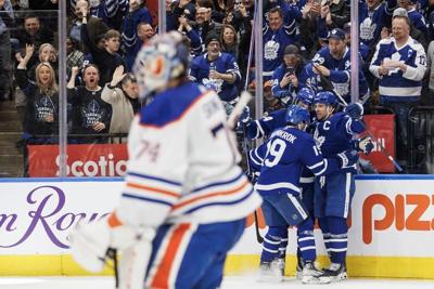 Maple Leafs score four times in the second period, down McDavid's Oilers 7-4