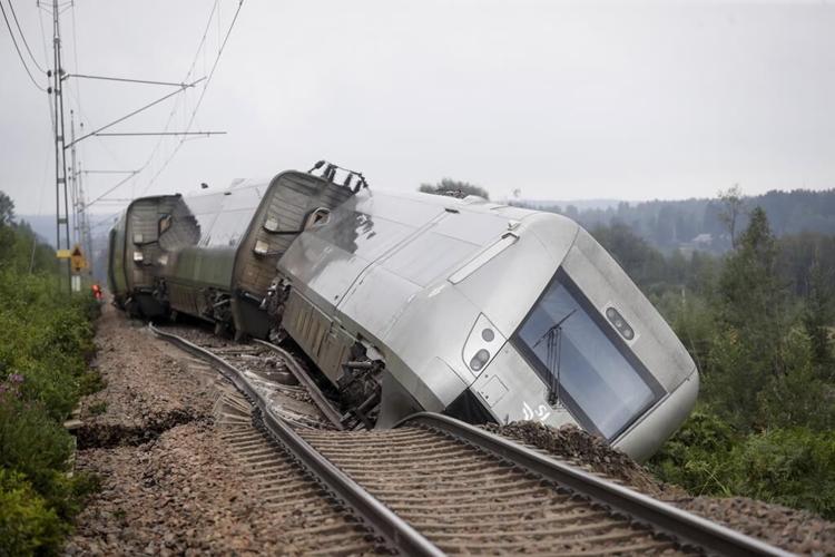 Stormy weather across northern Europe kills at least 1 person, idles ferries and delays flights