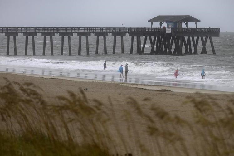 The Latest: Debby blamed for at least 4 deaths in Florida as it bears down on Georgia