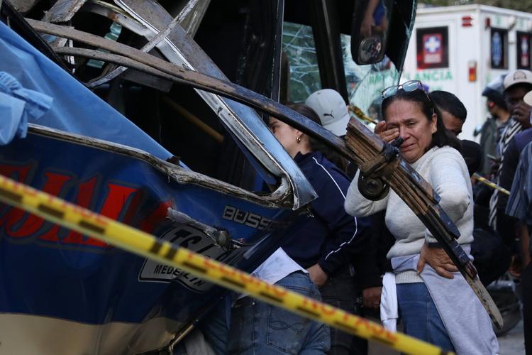 An explosive device kills 13 and injures 38 on a bus in southwestern Colombia as violence persists