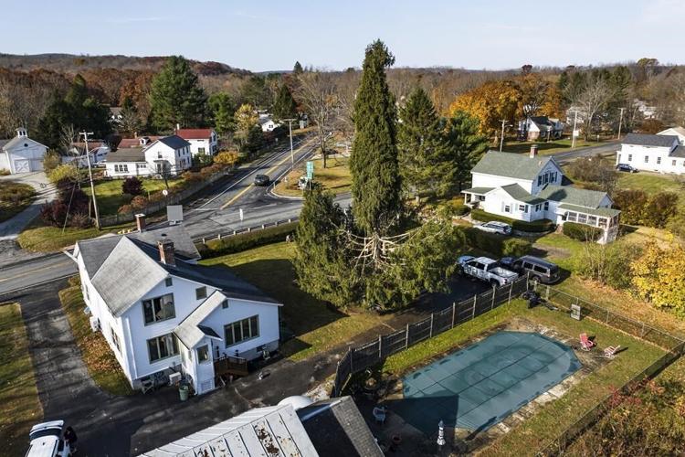 Crowds flock to tiny Massachusetts town to send off New York's Rockefeller Christmas tree