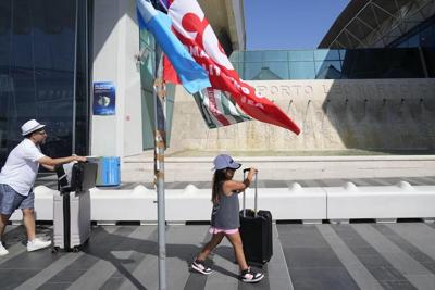 Hundreds of flights across Italy are canceled amid air transport strike at peak of tourism season