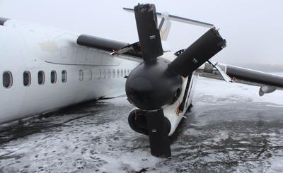 Blown tire blamed for causing passenger plane's landing gear to collapse in Halifax
