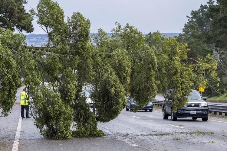 Second atmospheric river in days churns through California, knocking out power and flooding roads