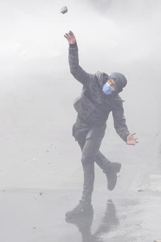 Argentine riot police disperse protesters with water cannons ahead of key Senate vote